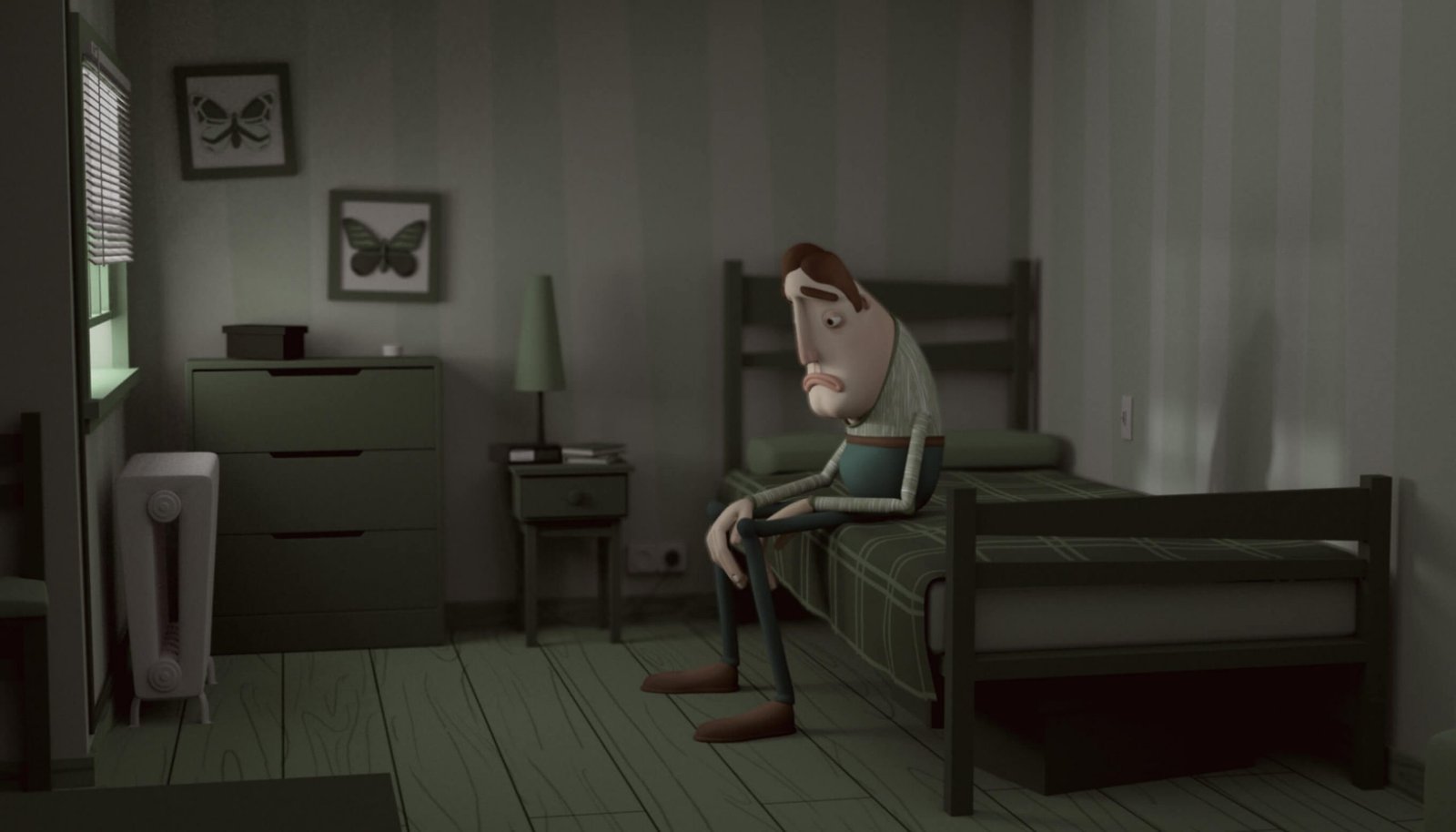Fotograma hombre deprimido sentado en cama